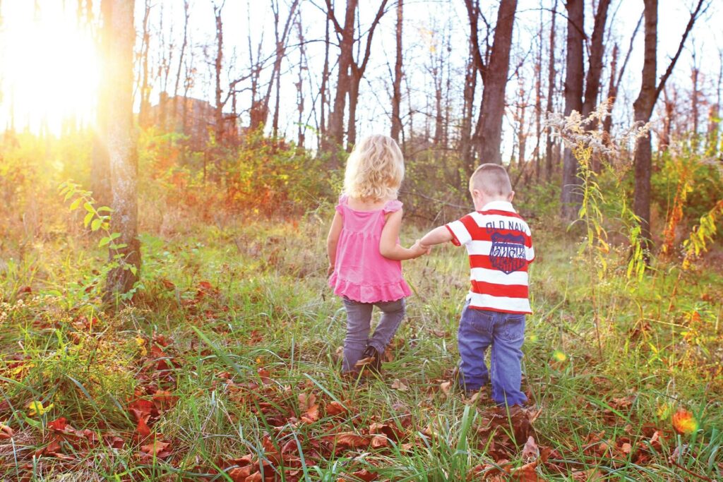 Boy and girl holding hands